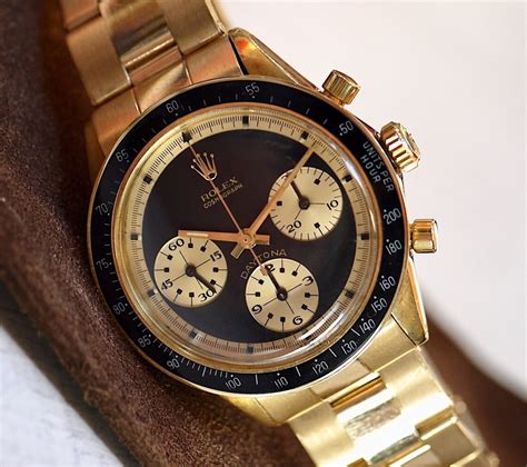 rolex daytona 6264 gold paul newman